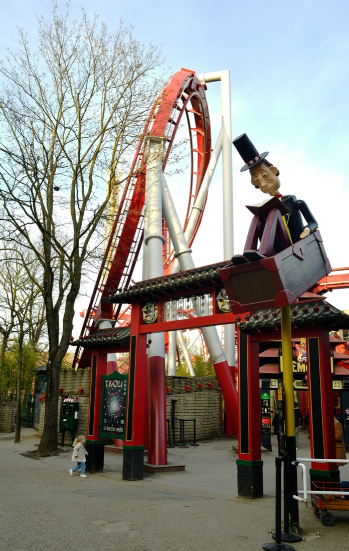 The Daemonen roller coaster behind its Chinese style entrance in Tivoli